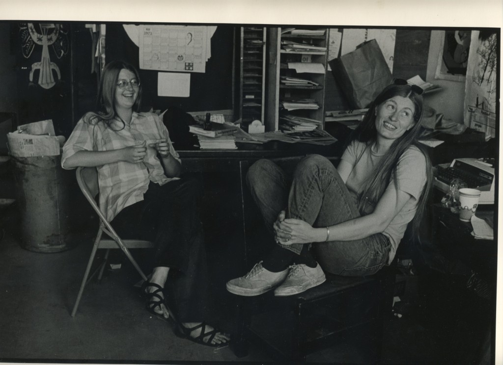 Ragstaffers laughing and smiling at work